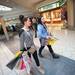 Black Friday shoppers carrying bags form several stores walk through the Briarwood mall.
Courtney Sacco I AnnArbor.com 